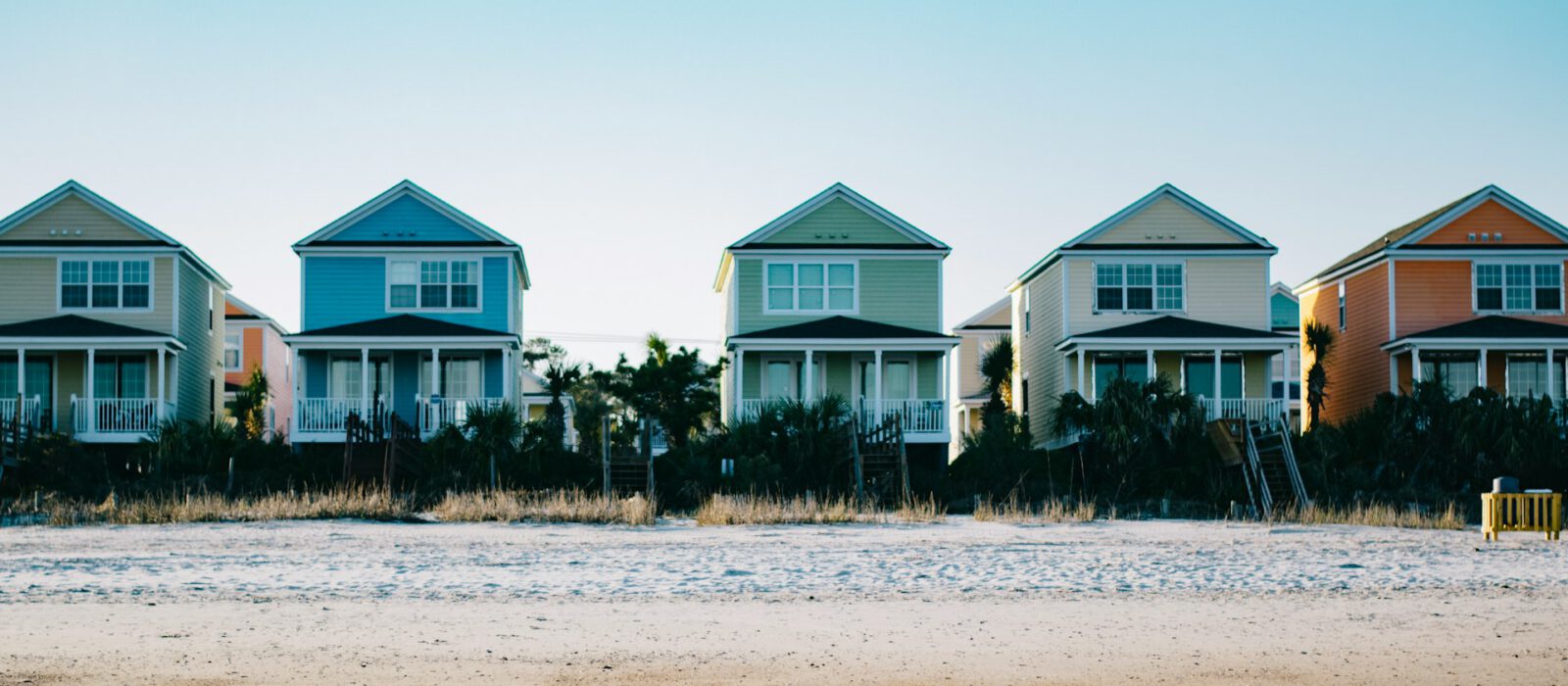 Row of small houses on the ocean